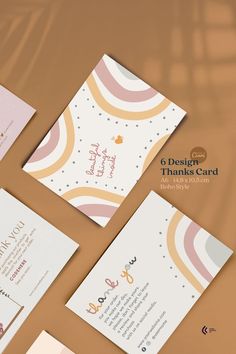 the wedding stationery is laid out on top of each other