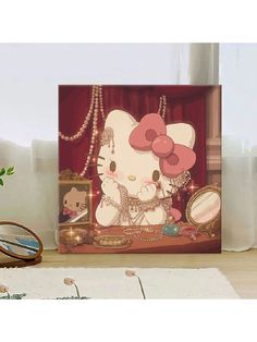 an image of a hello kitty with pearls on it's head sitting in front of a mirror