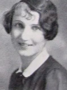 an old black and white photo of a woman