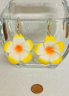 Hawaii 1.75 inch foam gold plated ear hooks dangling earrings. The drop length is 2.5 inches. The gold plated earring hooks are nickel free and tarnish resistant making them great for sensitive ears. These fun and lightweight earrings are a great gift for someone special! Yellow Hypoallergenic Flower-shaped Earrings, Gold Flower-shaped Earrings For Beach, Yellow Dangle Hoop Earrings With Ear Wire, Yellow Nickel-free Drop Flower Earrings, Yellow Beach Earrings With Ear Wire, Yellow Earrings For Beach With Ear Wire, Yellow Earrings With Ear Wire For Beach, Yellow Hypoallergenic Flower Drop Earrings, Hypoallergenic Yellow Flower-shaped Earrings