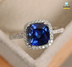 Sapphire ring, cushion cut engagement ring, solid white gold , halo ring, September birthstone, gifts for women, Gemstone ring, Gemstone, Sapphire Cushion Ring, Sapphire, Cushion, Cushion Engagement Ring. ♠ Stone Details ➵ Sapphire weight: Approx. 2.75 CT ➵ 3.0 Ct Approx. Total ➵ Gemstone: Sapphire ➵ Stone Color (Blue) ➵ Stone Luster: Excellent ➵ Stone Clarity: VVS1 ➵ Stone Make: High Quality ➵ Center Stone Shape: Cushion Cut ➵ Metal Change(10k/14k/18k White/Yellow/Rose Gold) ➵ Handmade item I a Elegant Sterling Silver Cushion Cut Halo Ring, Square Cut Halo Ring For Formal Occasions, Cubic Zirconia Cushion Cut Halo Promise Ring, Cubic Zirconia Halo Ring For Promise, Cushion Cut, Silver Halo Ring With Asscher Cut, Silver Cushion Cut Diamond Ring With Halo Design, Elegant Silver Cushion Cut Halo Ring, Wedding Sapphire Ring Cushion Cut, Elegant Square Cut Ring With Halo Design