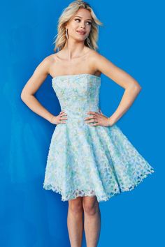 Make a grand entrance in this floral applique short strapless dress with an A-line skirt by Jovani 07965. This dress is crafted from luxurious tulle fabric adorned with intricate floral print and sparkling beads that shimmer with every move. The strapless neckline accentuates your shoulders, and the fit and flare silhouette creates an enchanting, classic shape that is both feminine and fun. With its short length, this dress ensures you’ll be comfortable while looking effortlessly chic and elegan Strapless Dresses Short, Straight Across Neckline, Strapless Cocktail Dress, Fluffy Skirt, Floral Cocktail Dress, Floral Fit, Short Cocktail Dress, Dress Images, Princess Seams