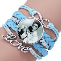 a bracelet with a picture of elvis presley on the front and blue braiding around it