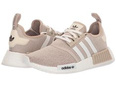 adidas Originals Kids NMD_R1 J (Big Kid) - Kids Shoes : Wonder Beige/Footwear White/Wonder White : Their chic style will make a standout appearance in the fun adidas Originals Kids NMD_R1 J sneakers. Breathable knit upper constructed in a solid color with bright synthetic tabs for a fun finish. Lace-up closure. Pull tab heel allows for easy on-and-off. Soft synthetic lining offers a sock-like fit. Ultra-cushioned boost midsole is optimized for a responsive ride. Durable rubber outsole with pod cutouts. Imported. Measurements: Weight: 7 oz Product measurements were taken using size 3.5 Big Kid, width M. Please note that measurements may vary by size. Casual Adidas Running Shoes With White Sole, Comfortable Adidas Sneakers For Light Sports, Comfortable Adidas Sneakers, Spring Athleisure Running Shoes With Adidas Logo, Spring Athleisure Adidas Running Shoes, Comfortable Adidas Running Shoes, Sporty Adidas Logo Sneakers With Textile Material, Neutral Adidas Shoes, Comfortable Adidas Sneakers With Synthetic Material