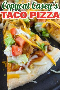 a close up of a slice of taco pizza on a plate with the text copycat casey's taco pizza