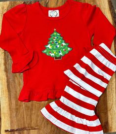 "Hi and Welcome to my store.  Thank you for stopping by to check out our cute little frill Christmas outfit.  I can add her name under the tree. Just add that at checkout in the comments to me.  The pants are stretchy so they fit well.  These shirts and pants are super soft and comfy.  Please let me know if you don't see your size. *Please note that I personalize the dresses, another company makes them.  💕 Our current production time is 5-7 days plus shipping time. If I need to order your item it will add 5 days to the process.    If you are needing a rush order please add the \"Rush My Order\" listing from my shop.  (please message me before you purchase this to make sure I have your item in stock)   https://www.etsy.com/listing/545381716/rush-my-order-1-2-day-processing-time? Thank you Holiday Long Sleeve Cotton Sets, Cotton Long Sleeve Sets For Holiday, Holiday Long Sleeve Sets For Fall, Holiday Fall Sets With Long Sleeves, Long Sleeve Holiday Sets, Christmas Cotton Sets For Festive Occasion, Festive Winter Cotton Sets, Festive Cotton Sets For Winter, Cotton Festive Winter Sets