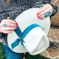 Charlie 1 Horse is wowing us with their amazing summer collection! Grab one of these quick before they're gone! The Old Apache hat by Charlie 1 Horse features straw material, a pinched front profile, a 3 1/2 inch brim, and a crown that measures 4 inch. The hatband is an elegant turquoise blue velvet material that fits perfectly around the base of the crown and includes a barbosa teepee concho pin to attach to the band. This genuine Charlie 1 Horse hats bears the brand "C," a sign that you are ge Blue Velvet Ribbon, Charlie 1 Horse Hat, Front Profile, Trendy Boutique Clothing, Giddy Up Glamour, Trendy Boutique, Western Hats, Velvet Material, Hat Band