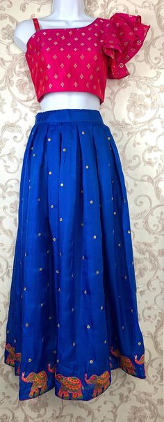 "Very elegant Lehenga choli in crop top style. Beautiful royal blue lehenga with pink crop top for girls. Raw silk top and georgette silk mix lehenga with stylish elephant embroidery on the border. Fit for a princess! Choli Measurements: Chest- 30\" (1\" extension buffer) Waist-28\" (1\" extension buffer) Length- 12.5 Lehenga measurements: Waist: 30\" max (comes with a string inside to tighten if needed) Length: 39\"" Fitted Royal Blue Choli With Resham Embroidery, Traditional Royal Blue Choli For Diwali, Fitted Royal Blue Choli, Royal Blue Resham Embroidered Choli For Diwali, Crop Top For Girls Stylish, Semi-stitched Royal Blue Choli For Festivals, Long Skirt Outfits Indian, Indian Dresses For Girls, Pink Lehenga Choli