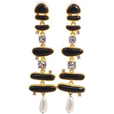 A pair of abstract dangling post earrings by Kenneth Jay Lane. Feature black enamel, prong-set crystals, and dangling faux pearls. For those who like making a statement with their accessories! Dimensions: each approx L 9.9 cm x W 2.6 cm (at widest part) Victorian Gold, Link Earrings, Blue Tanzanite, Emerald Color, Enamel Ring, Uncut Diamond, Dangling Earrings, Gold Earrings Dangle, Kenneth Jay Lane