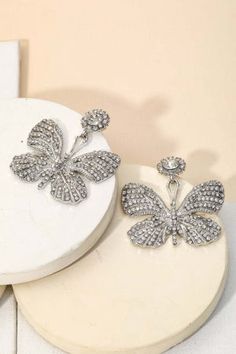 🖤 Add some sparkle to your ears with these gorgeous Rhinestone Clear Butterfly Earrings. Perfect for any occasion, these earrings feature a stunning butterfly design and are adorned with clear rhinestones, adding a touch of elegance to any outfit. Treat yourself or someone special to these unique and playful earrings today! 🖤 Item Feature: clear, butterfly shape, light wight, push back closure, elegant, fancy, must have, date night. Butterfly-shaped Rhinestone Party Jewelry, Butterfly-shaped Party Jewelry With Rhinestones, Butterfly Shaped Party Jewelry With Rhinestones, Party Jewelry With Rhinestones And Butterfly Shape, Party Jewelry With Rhinestones In Butterfly Shape, Party Butterfly Earrings With Charm, Party Butterfly Charm Earrings, Butterfly Charm Earrings For Party, Party Earrings With Butterfly Charm