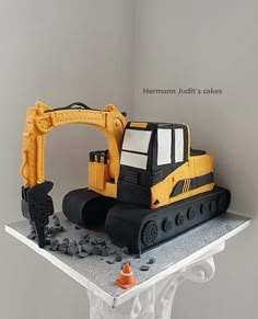 there is a cake made to look like a construction vehicle