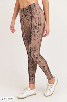 Our snake-print activewear is a statement piece. These leggings come in dark pink with contrasting serpentine scales. The leggings also feature a discreet phone pouch on the high waistband. 81% nylon, 19% spandex. Tummy control. Moisture-wicking. Four-way stretch. Mommy Tummy, Activewear Print, Stylish Activewear, Graphic Leggings, Clothing Retail, Bootcut Pants, Active Leggings, Phone Pouch, High Rise Leggings