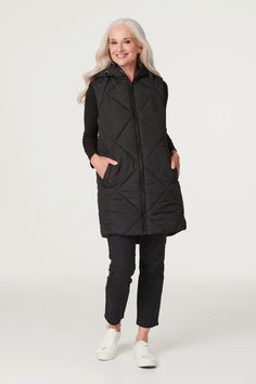 Add a transitional layer to your closet with this versatile and stylish puffer vest. It has a hood, a zip front closure, handy pockets, a sleeveless fit and a sleek longline silhouette dropping to thigh length. Perfect for adding some extra warmth to an outfit. Pair with trainers for a chic off-duty style. Occasion Dresses Wedding Guest, Puffer Gilet, Petite Jumpsuit, Petite Coat, Plus Size Coats, Tall Clothing, Stunning Outfits, Tshirt Skirt, Petite Tops