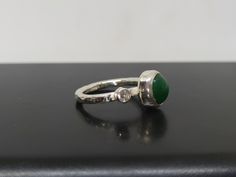 ARTSMYRNA METAL: 925k Silver GEM: Jade ( lab created ) COATING: 24k gold over (We can made a special type of coating for your personal preference ) MATERIEL : 925K Sterling Silver ( Some of my items vermeil gold over silver for looks rich . But i can finish in silver too ) PAYMENT : We accept paypal payment RING SIZE: 6 (your desired size is made) GEM FEATURES AND BENEFITS Benefits of Jade Gem * You can choose this special gem to eliminate emotional and spiritual imbalance and to remain calmer. Green Bezel Set Stackable Rings As Gift, Green Stackable Rings With Bezel Setting As Gift, Unique Green Stackable Promise Rings, Unique Green Stackable Rings, Adjustable Green Emerald Ring For Anniversary, Unique Handmade Green Stackable Rings, Green Sterling Silver Rings With Bezel Setting, Green Sterling Silver Stackable Open Rings, Green Stackable Sterling Silver Rings