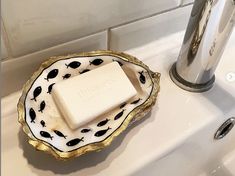 a bar of soap sitting on top of a plate