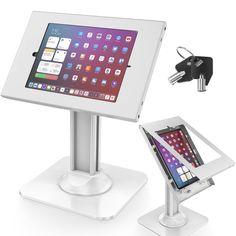 an ipad and tablet stand with keys attached to it