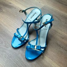 Brand: Baldinini Color: Blue Size: 39 European Condition: Like New, Never Worn Light Blue Sandals With Padded Heel For Evening, Light Blue Evening Sandals With Padded Heel, Blue Low Heel Sandals With Removable Insole, Blue Low Heel Sandals With Heel Loop, Elegant High Heel Blue Sandals, Blue Low Heel Sandals With Heel Strap, Elegant Blue Sandals With 4-inch Heel, Elegant Blue Sandals With Padded Heel, Formal Light Blue Sandals With Padded Heel