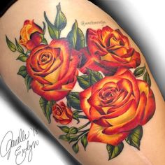 a woman's thigh with roses on it