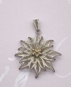 Vintage Italian filigree flower pendant, 800 silver, diameter 4cm. Elegant Flower-shaped Large Pendant Jewelry, Elegant Flower Shaped Large Pendant Jewelry, Elegant Floral Large Pendant Jewelry, Antique Engraved Flower Jewelry, Antique Flower Engraved Jewelry, Ornate White Gold Jewelry With Filigree, Antique Silver Filigree Jewelry, Antique Silver Jewelry With Filigree, Silver Flower-shaped Engraved Jewelry