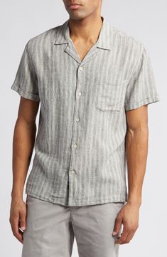 Made from a lightweight linen blend ideal for warm days, this striped camp shirt offers laid-back style with cuffed short sleeves and a chest pocket. 28 1/2" length Front button closure Notched collar Short sleeves Chest patch pocket 54% linen, 46% Lenzing™ EcoVero™ viscose Lenzing EcoVero viscose is a sustainably produced fiber using pulp made from renewable wood sources and certified with the EU Ecolabel for high environmental standards, including lower emissions and water usage than generic v Spring Linen Camp Shirt With Relaxed Fit, Spring Linen Relaxed Fit Camp Shirt, Casual Linen Short Sleeve Shirt, Linen Camp Shirt With Pockets For Beach, Beach Linen Camp Shirt With Pockets, Casual Linen Relaxed Fit Short Sleeve Shirt, Striped Short Sleeve Beach Shirt, Striped Short Sleeve Shirt For Vacation, Linen Button-up Camp Shirt For Beach