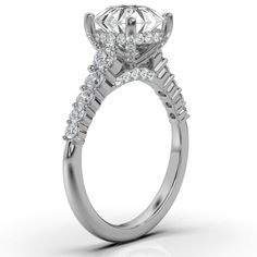 a diamond engagement ring with three stones on the side