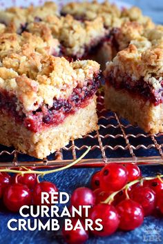 red curran crumble bars on a cooling rack with cherries