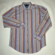 Tommy Hilfiger Men's Shirt Size Large Long Sleeve Button Up Multicolor Stripe. In very good preowned condition. Please see pictures for color, and measurements. Shipping is FREE. See my listings for other shirt options. Thank you for Looking. Formal Multicolor Cotton Shirt, Classic Multicolor Formal Shirt, Formal Multicolor Button-up Shirt, 80s Striped Shirt, Yarn-dyed Striped Button-up Shirt, Vintage Striped Shirt, Vintage Button-up Shirt With Striped Collar, Striped Button-up Cotton Dress Shirt, Tommy Hilfiger Cotton Button-up Shirt