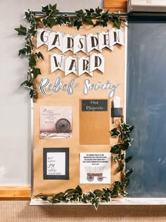 a bulletin board with ivy and letters on it