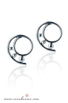 If you are on the hunt for simple earrings with a huge impact, you are looking at them right now. This unique pair of spiral silver studs is a festive way to explore styling.