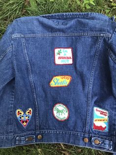 80s denim jacket with patches MATERIAL 100% cotton MAKER: Wrangler made in the USA CONDITION great thrashed vintage condition patches all over light staining from use SIZE small 38 check measurements as vintage sizes are different from today double measurements for exact size no stretch to the material shoulder 17 in. pit to pit 20 in. length 21 in. waist 17 in. arm inseam 17 in. model is 5'6'' bust 33in. waist 27in hips 35in. wears a dress size 3/4 SHIPPING: standard priority shipped with track Retro Spring Denim Jacket With Patches, Spring Retro Denim Jacket With Patches, Retro Cotton Denim Jacket With Patches, Retro Denim Jacket With Patches For Fall, Vintage Patchwork Denim Jacket For Festivals, Retro Denim Jacket With Patches, Vintage Denim Jacket With Embroidered Patch For Spring, Vintage Medium Wash Outerwear With Patches, Vintage Outerwear With Patches In Medium Wash