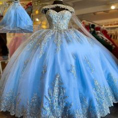 a blue ball gown on display in a store