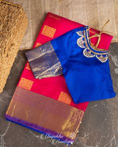 "Color : Magenta and Blue Magenta Pink and Deep Blue Kanchipuram ❤️❤️ How lovely this combination is ❤️ Magenta Pink body with Navy blue combination Pallu and Blouse. The body of this saree has \"Geometrical motifs\". Grab this beautiful bridal collection. This saree is for sure to look even more stunning when worn for any occasion.  This saree is very easy to drape and falls elegantly making it so effortless to carry around. *Fall, Pico & Tassels : Done *Condition : New Saree With Stitched Blou Blue Zari Weaving Blouse For Eid, Zari Weaving Blouse For Eid, Blue Blouse With Zari Weaving For Eid, Zari Weaving Blouse For Eid And Traditional Ceremonies, Blouse With Zari Weaving For Eid And Traditional Ceremonies, Red Anarkali Blouse With Traditional Patterns, Anarkali Blouse With Motifs For Traditional Ceremonies, Eid Multicolor Blouse With Motifs, Anarkali Blouse With Traditional Patterns In Multicolor