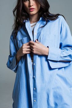 Introducing our Oversized Boyfriend Style Baby Blue Shirt – a laid-back and chic addition to your wardrobe. This shirt features a polo collar, 3/4 sleeves, and chest pockets, embodying the perfect blend of comfort and style.  Crafted from a lightweight woven fabric, this shirt is ideal for daily wear, offering versatility to pair with jeans or skirts for a casual yet fashionable look. The button placket adds a classic touch, making it the perfect piece to effortlessly throw over any outfit.  Made from 100% Polyester, this shirt ensures both comfort and durability. The baby blue hue adds a refreshing and vibrant touch to your ensemble, making it a standout piece in your collection.  The model showcasing this shirt is wearing size S, with measurements of 33-24-35 and a height of 5'8''. Pleas Baby Blue Shirt, Boyfriend Cut, Cut Shirt, Denim Pocket, Oversized Long Sleeve, Boyfriend Style, Boyfriend Shirt, Long Sleeve Polo, Cut Shirts