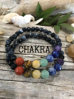 1 Chakra Bracelet A Beautiful bracelet with all the Crystals of the Chakras Each bracelet comes with a Chakra chart! 8mm Genuine 7 Chakra Gemstones, with 6mm black faceted agates! 1. Red Jasper, 2. Yellow Tiger Eye, 3. Orange Aventurine, 4. Green Aventurine, 5. Sodalite, 6. Lapis lazuli, 7. Amethyst Message us If a different size is needed 🐚Designing with inspiration from the Peace nature brings. 🐚We guarantee all our jewelry and will always repair our pieces for free no questions asked! 🐚We Spiritual Stackable Charm Bracelet, Adjustable Stackable Spiritual Charm Bracelet, Spiritual Stackable Round Beads Friendship Bracelets, Spiritual Stackable Friendship Bracelets With Round Beads, Spiritual Stackable Friendship Bracelets, Spiritual Rainbow Bracelets For Jewelry Making, Spiritual Stackable Bracelets For Jewelry Making, Spiritual Stackable Charm Bracelet With Round Beads, Stretch Beaded Bracelets Diy