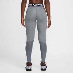 The Nike Pro 365 Women's Tights are perfect for your workout collection. They're snug to your body, ensuring they won't interfere with your best workout. Plus, the Nike branding around the waist will let everyone in the gym know you have an eye for quality. Features: Mid-rise. Tight, body-hugging fit. Nike Dri-FIT technology helps you stay dry, comfortable and focused. A wide, smooth mid-rise waistband feels supportive around your core. Ventilated mesh panels along the back of the lower legs cre Women's Tights, Mesh Panel Leggings, Nike Branding, Nike Pro Leggings, Nike Pro Women, Gym Fits, Best Workout, Womens Tights, Stretch Leggings