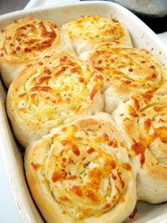 baked bread with cheese and sauce in a baking dish