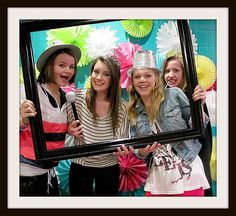 Photo booth - Plastic tablecloths for the background with paper fans of different sizes/shapes/colors. This one's for a sweet 16 (really cute party btw), so I'd change the colors Centerpieces Quince, Centerpieces Quinceanera, Quince Cakes, Quinceanera Centerpieces, Candy Centerpieces, Sweet 16 Photos, Quince Decorations, Traditions To Start