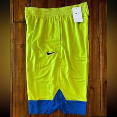 Mens Size Large Tall New With Tags Yellow Athletic Shorts With Built-in Shorts For Spring, Nike Yellow Sport Bottoms, Nike Yellow Bottoms For Summer, Nike Yellow Summer Bottoms, Neon Yellow Sports Shorts, Yellow Sports Shorts For Spring, Yellow Athletic Shorts For Sports In Spring, Yellow Athletic Shorts For Spring Sports, Casual Yellow Nike Bottoms