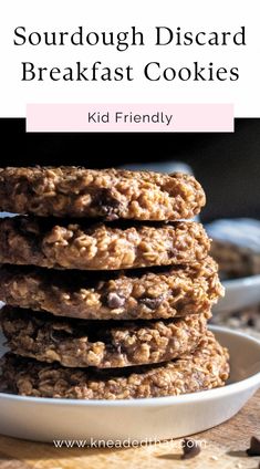 a stack of cookies sitting on top of a white plate