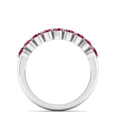 Introducing our exquisite diamond and ruby wedding ring, a symbol of eternal love and commitment. Crafted with precision and elegance, this stunning piece features a row of sparkling diamonds and vibrant rubies set in a sleek band of your choice. The combination of the brilliant diamonds and rich red rubies creates a captivating contrast, making this ring a true statement of sophistication and romance. Metal: 14K Gold Setting Type: Prong Rhodium Finish: Yes, on White Gold Gemstone Details: Gemst Elegant White Gold Ruby Ring With Half Eternity, Promise Ruby Diamond Ring With Prong Setting, Luxury Ruby Ring With Half Eternity Round Cut, Luxury Ruby Half Eternity Ring For Anniversary, Luxury Ruby Half Eternity Ring, Red Ruby Ring With Single Cut Diamonds, Promise Ruby Ring With Prong Setting, Classic Ruby Ring In Diamond White, Elegant Ruby And Diamond Half Eternity Ring