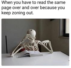 a skeleton sitting at a desk with an open book in front of it and the caption reads, when you have to read the same page over and over cause you keep zone