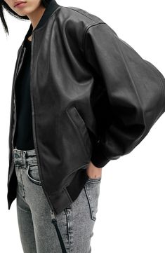 Rock a classically cool look with this buttery-soft sheepskin-leather jacket cut in a slightly oversized bomber fit that adds edgy style to any look it's layered over. 25" length (size Medium) Front zip closure Blade collar lined Ribbed cuffs and hem Front welt pockets Leather Professional leather clean Imported Slouchy Leather Jacket, Oversized Leather Jacket, Dtf Designs, Cool Look, Edgy Style, Rock A, Black Leather Jacket, Winter 2024, Winter Looks