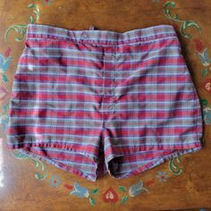 Vintage mens red and blue plaid swim shorts. Inner lining is kind of stretched out, otherwise on good condition. 31" waist, 13 1/2" length. Summer Cotton Lined Bottoms, Lined Cotton Bottoms For Summer, Summer Lined Cotton Bottoms, Fitted Cotton Swim Trunks, Plaid Cotton Shorts For Beach, Plaid Cotton Beach Shorts, Plaid Cotton Shorts For The Beach, Fitted Cotton Swim Trunks For Poolside, Retro Summer Lined Bottoms