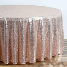 a round table covered in pink sequins