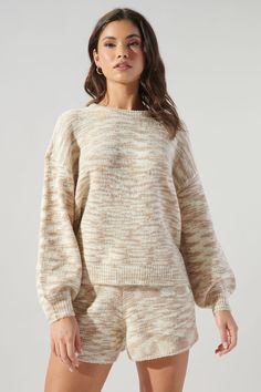 A little cool weather never hurts, especially in the Saguaro Space Dye Sweater. Keep things cute and cozy in this slouchy knit with long raglan sleeves and a classic round neck. It maintains a boxy fit, making it easy to style with jeans or the matching shorts.- Boxy fit- Raglan sleeve- Space dye- Knit- Color: Oatmeal WhiteSize + Fit - Model is 5'8" and wearing size XS- Measurements taken from size S - Chest: 23 1/2"- Length: 21" Fabric Self: 100% Polyester Style Number STT16453 Cozy Knit Cropped Sweater With Ribbed Cuffs, Cozy Textured Knit Cropped Sweater For Loungewear, Cozy Slouchy Cropped Sweater, Cozy Slouchy Crew Neck Sweater, Slouchy Cozy Crew Neck Sweater, Cozy Slouchy Sweater With Ribbed Cuffs, Slouchy Cozy Sweater With Ribbed Cuffs, Comfortable White Fall Sweater, Comfortable White Sweater For Fall