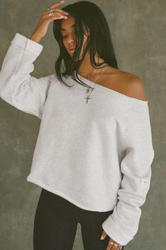 Oversized, off-the-shoulder pullover with a wide neckline and raw hem. Custom knit french terry fabric Brushed mid-weight cotton - ideal for layering Soft, comfortable and made to last Color: Pearl Grey French Terry Sizing: S/M (0-4), M/L (6-10) Model is 5'8" and wearing size S/M Fabric: 98% Cotton, 2% Polyester Care: Machine Wash Cold With Like Colors.Care: Tumble Dry Low. JOAH BROWN | MADE IN LOS ANGELES