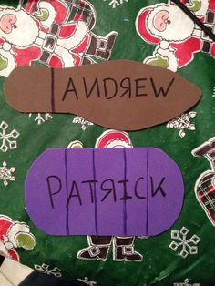 the name patrick written on a piece of paper with santa claus in the back ground