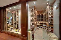 a wine cellar with lots of bottles in it