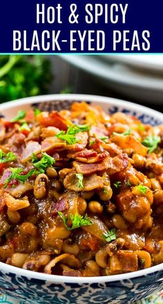 a bowl filled with black eyed peas on top of a blue and white table cloth