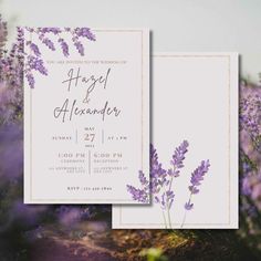 two wedding cards with lavender flowers in front of them on top of a purple field